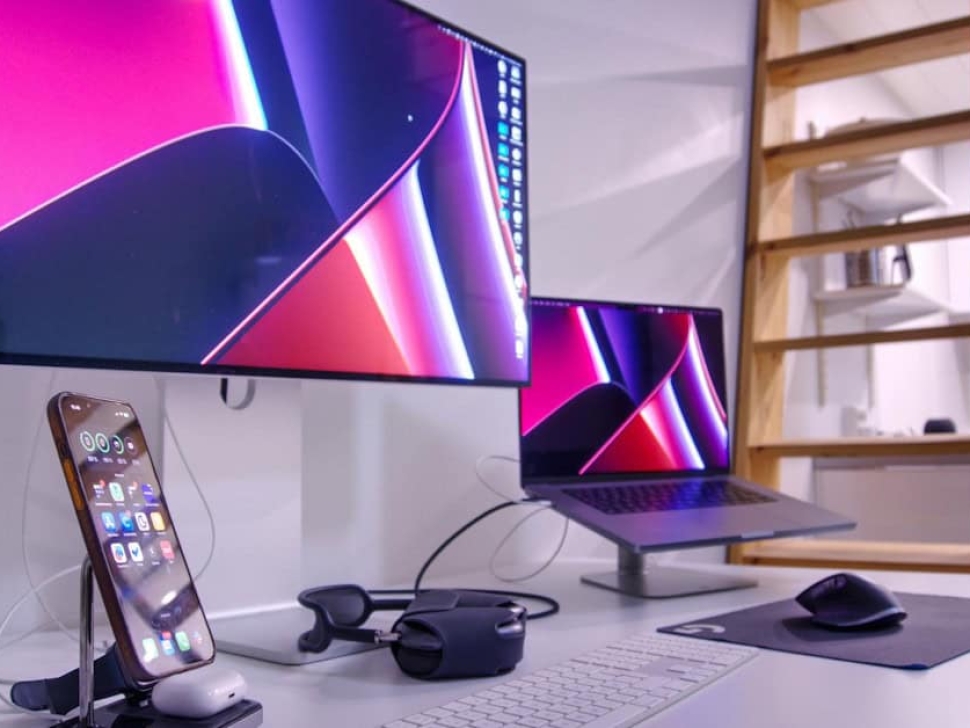 Small business owner reviewing website design pricing chart to determine fair costs for professional web design services by Clean Design Launch.