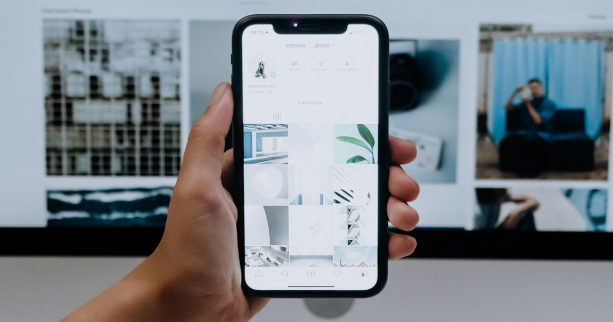 Mobile phone showing a clean modern layout representing mobile friendly website design